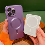 a person holding a purple iphone case