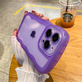 A person holding a purple phone case