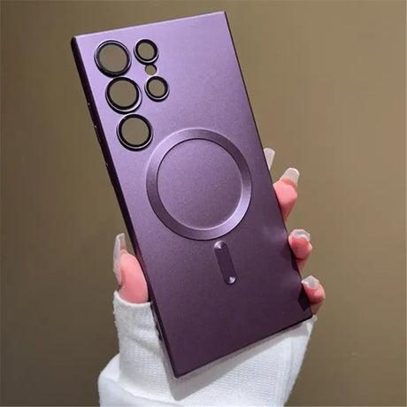 A person holding a purple phone case