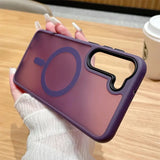 a person holding a purple phone case