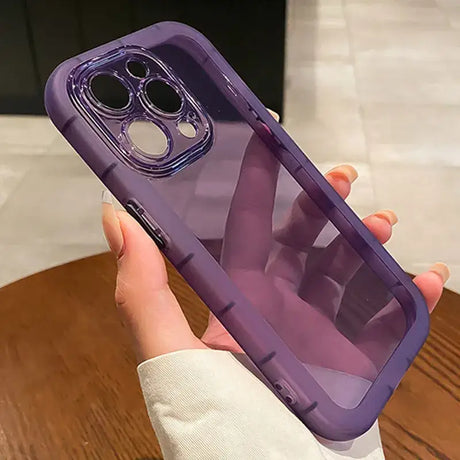 A person holding a purple phone case