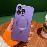 a person holding a purple phone case