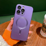 A person holding a purple phone case