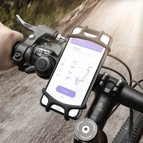 a person riding a bike with a phone in their hand