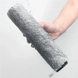 A person holding a roll of felt with a hand