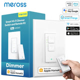 a person is holding a smart light switch