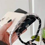a person holding a smart watch in their hand