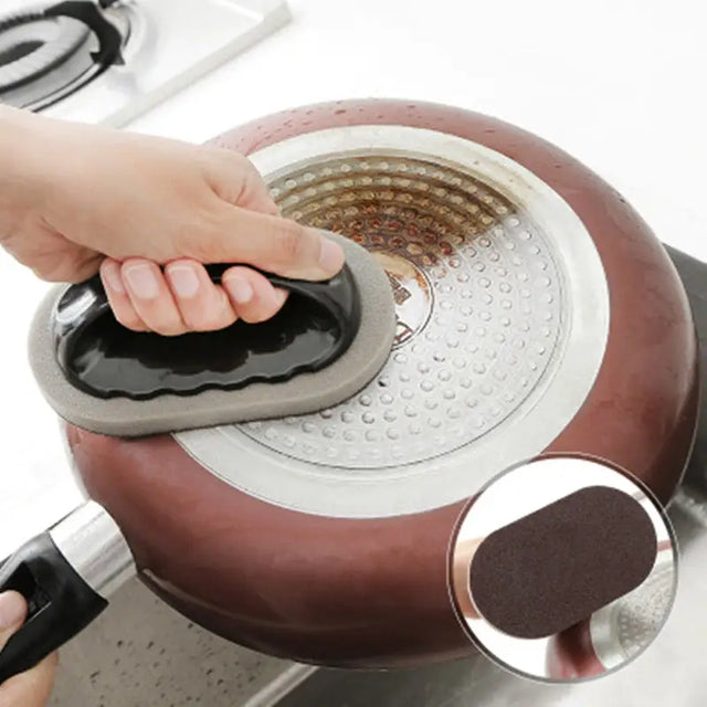 a person using a tea strainer to remove the tea