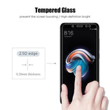 a hand touching a finger on the screen of a smartphone