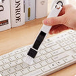 a person using a usb to type on a computer