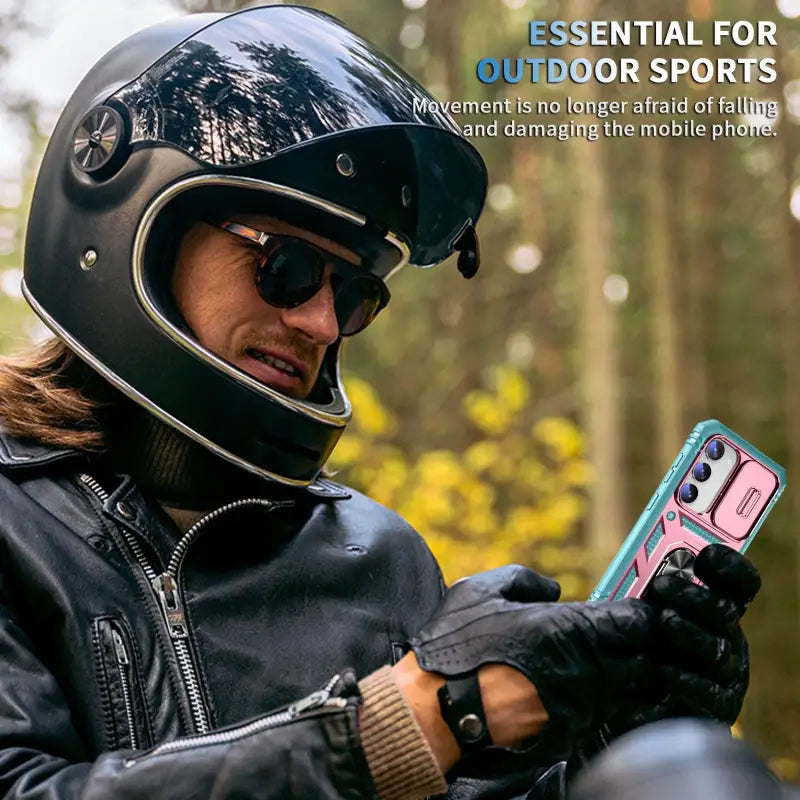 a woman wearing a helmet and holding a cell