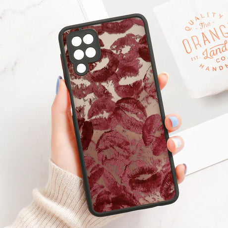Back side of samsung galaxy s series phone case with black border and deep red lipstick smudge line art design on clear background