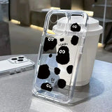 a phone case with a black and white cow pattern