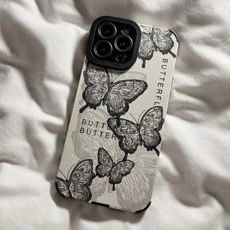 A phone case with a black and white butterfly print