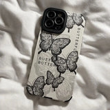 A phone case with a black and white butterfly print