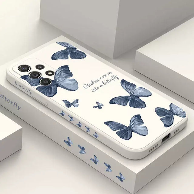 a phone case with blue butterflies on it