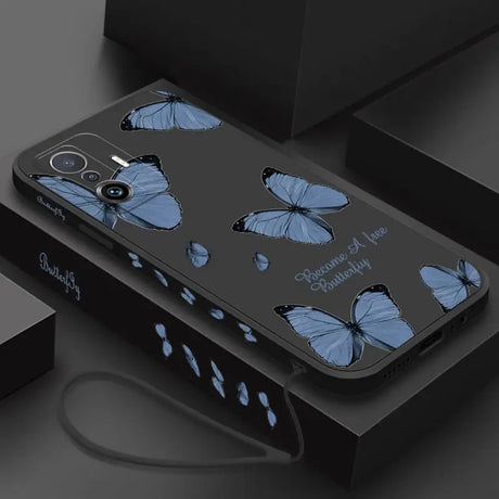 a phone case with blue butterflies on it