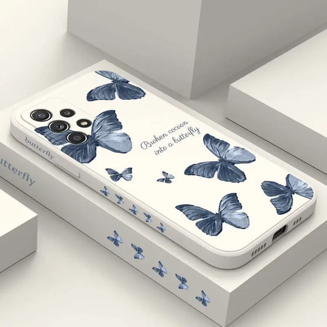 a phone case with blue butterflies on it