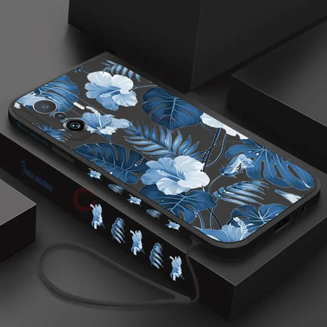 A phone case with blue flowers on it