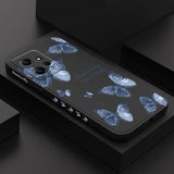 the back of a black iphone case with blue flowers
