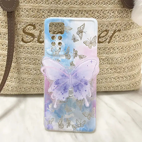 A phone case with a butterfly design on it