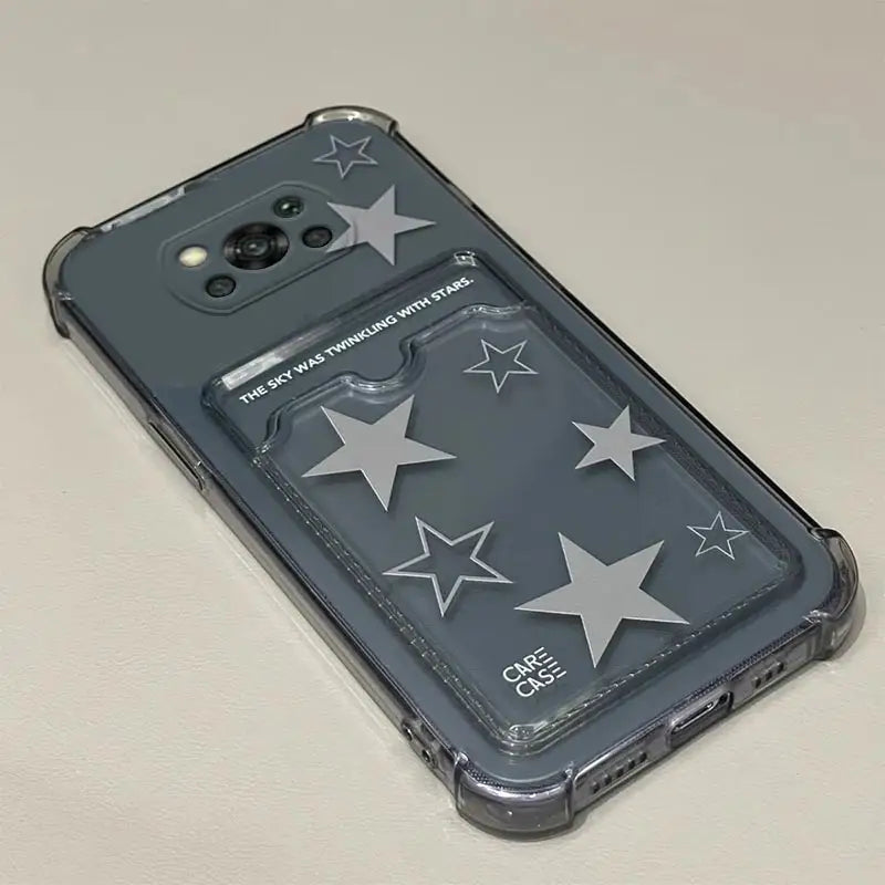 the back of a black case with stars on it