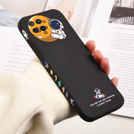 a person holding a phone case with a dog on it