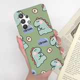 someone holding a phone case with a cartoon dinosaur design on it