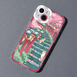 A phone case with a cartoon illustration of a city