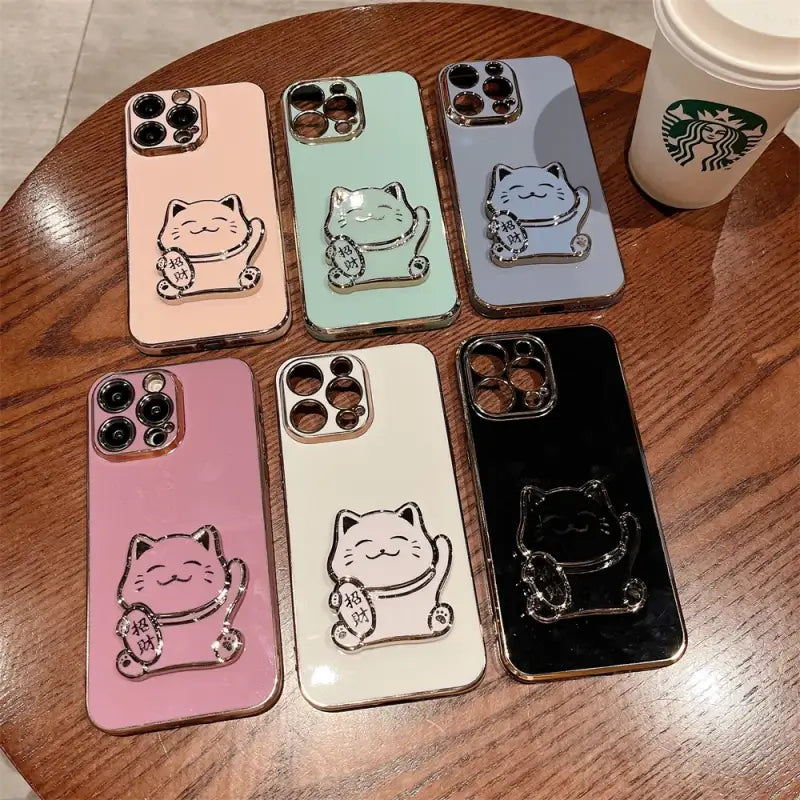 A phone case with a cat design on it