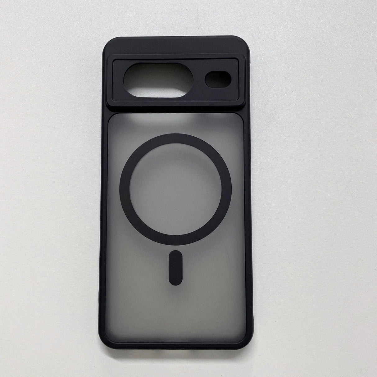 Phone case with a circular cutout, likely for wireless charging compatibility.