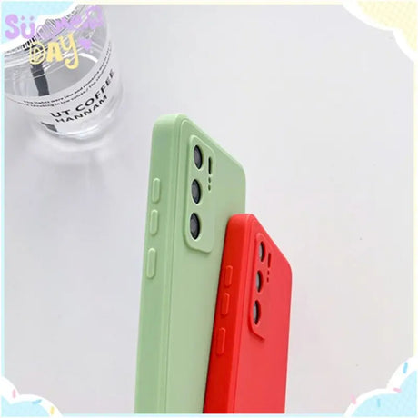 a phone case with a red and green cover
