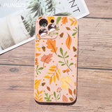 A phone case with a colorful floral pattern