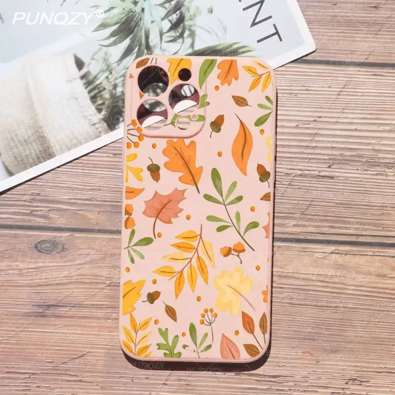 a phone case with a colorful floral pattern