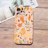 a phone case with a colorful floral pattern