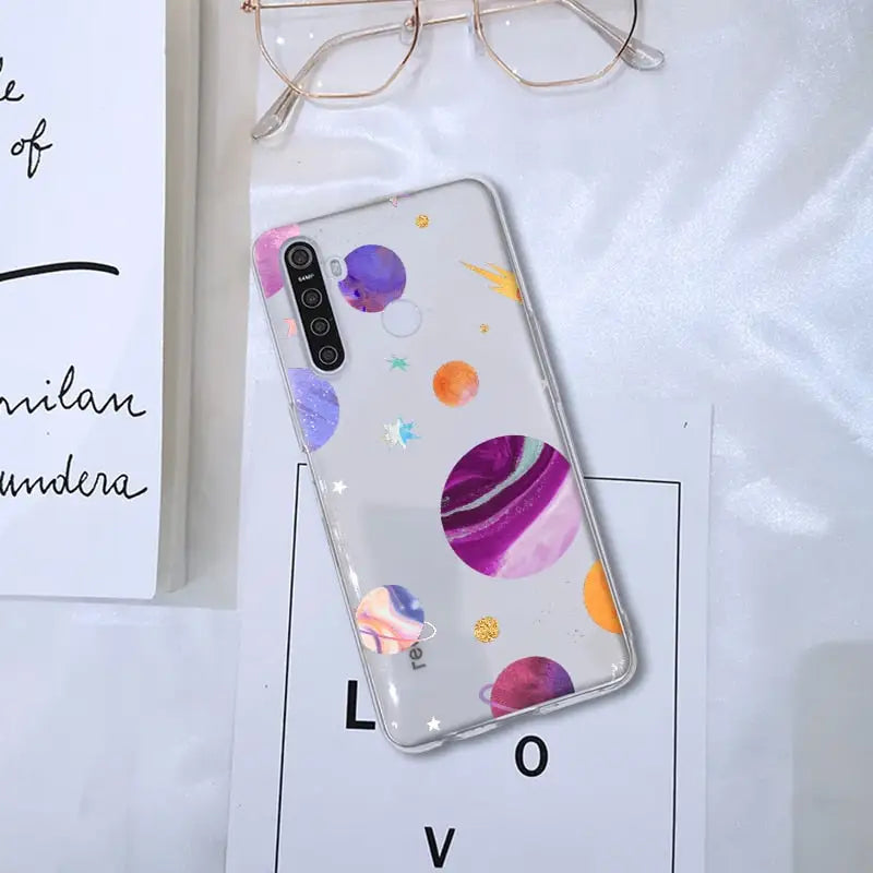 a phone case with a watercolor painting pattern on it