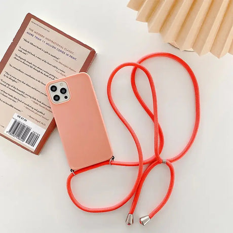 a red phone case with a red cord