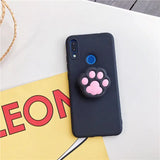 a phone case with a cute cat face