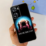 a person holding a phone case with a spaceman on it