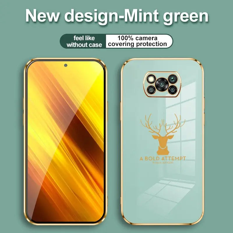 a phone with a gold case and a deer head