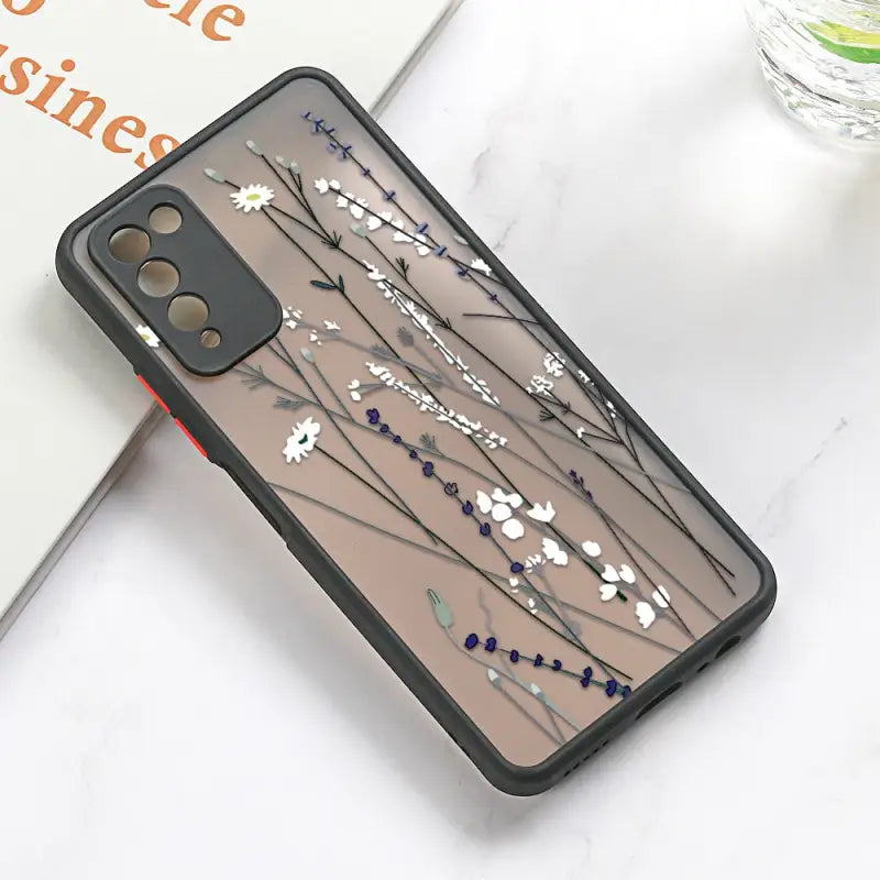 a phone case with a flower design on it