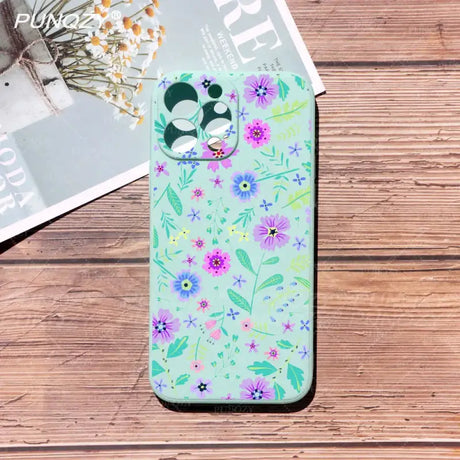 A phone case with a floral pattern on it