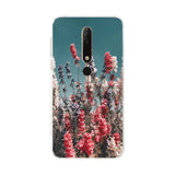 a phone case with a flower field