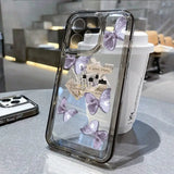 a phone case with a purple flower design