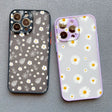 a phone case with a flower pattern and a pair of sunglasses