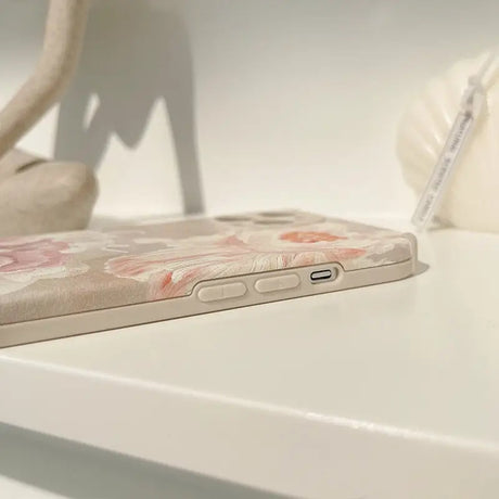 a phone case with a flower design on it