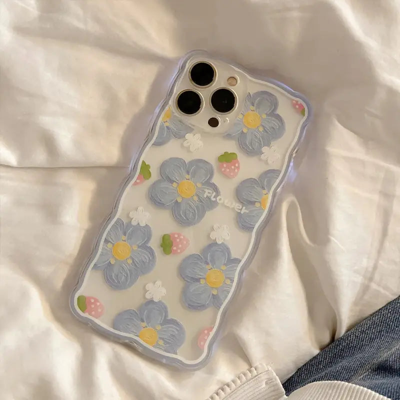 a phone case with flowers on it