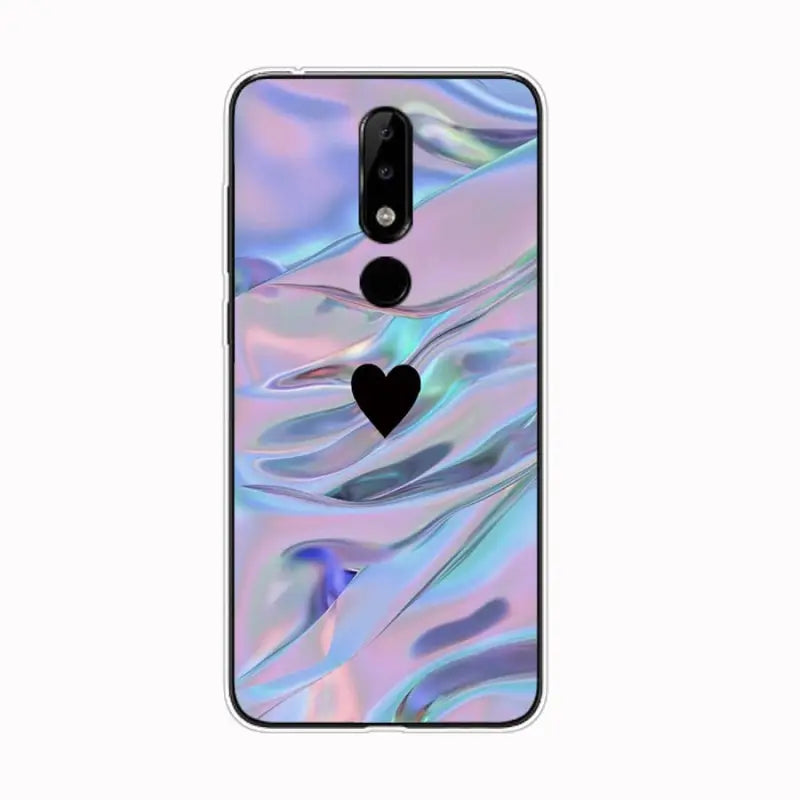 a close up of a phone with a heart on it