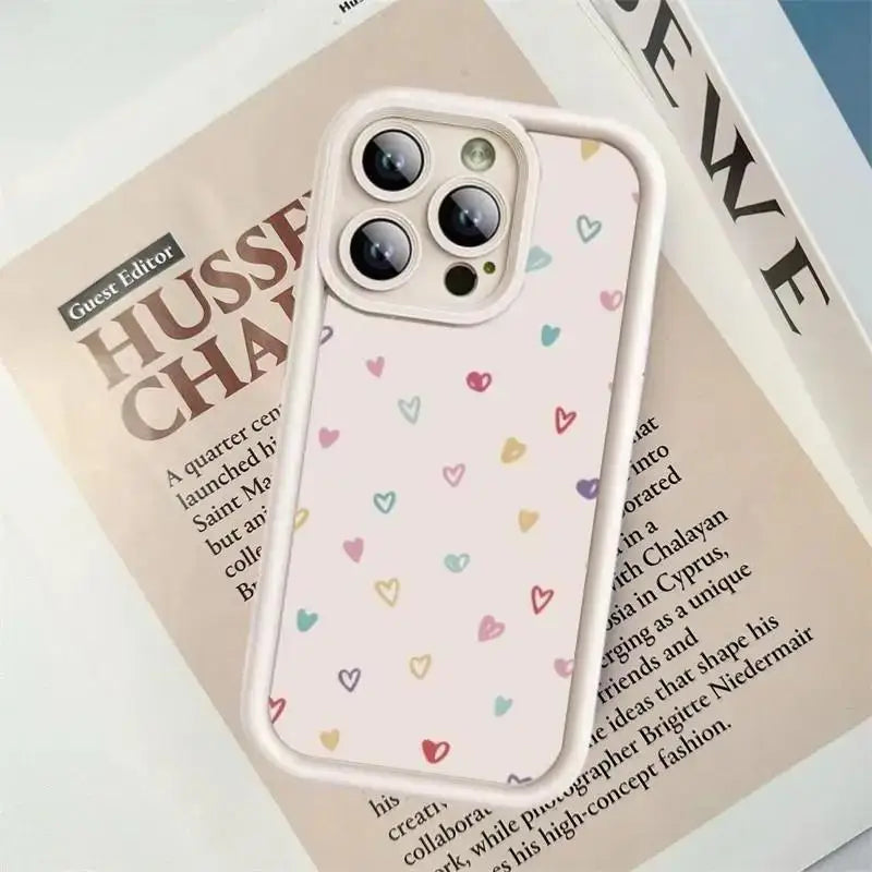 a phone case with hearts on it