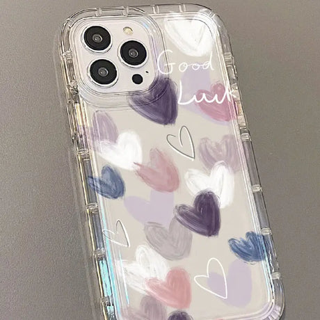 a phone case with hearts painted on it